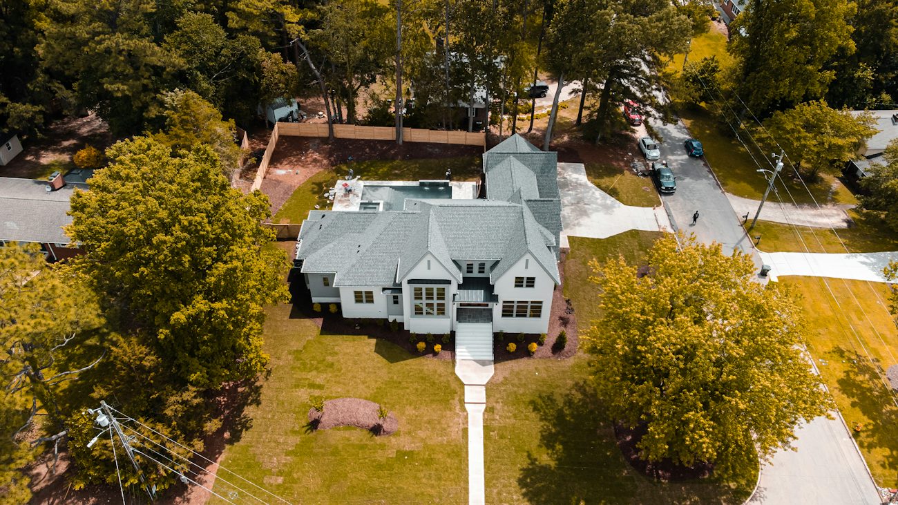 Aerial view of a home and its roof